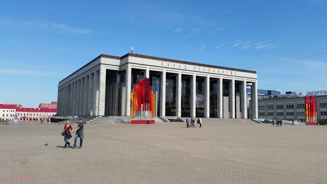 white and gray concrete building under blue sky during daytime